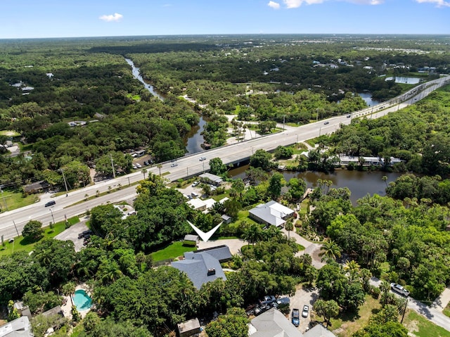 4904 River Pl, Fort Pierce, FL 34982 - aerial view of residential area with a nearby body of water, a notable bridge, a forest, and a highway