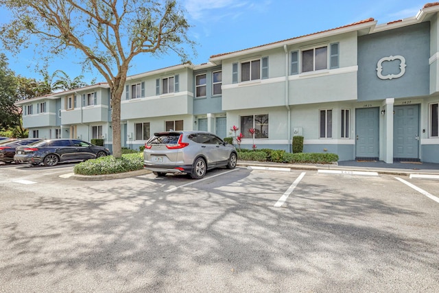 3423 Sonoma Dr, Riviera Beach, FL 33404 - view of property featuring uncovered parking and a residential view