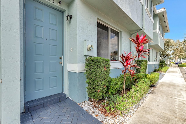 3423 Sonoma Dr, Riviera Beach, FL 33404 - property entrance featuring stucco siding