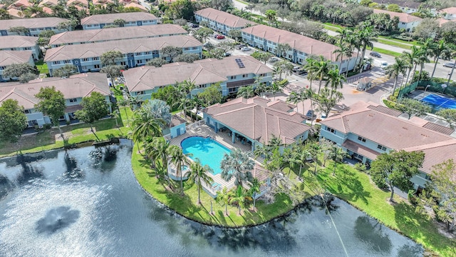 3423 Sonoma Dr, Riviera Beach, FL 33404 - drone / aerial view of a pool and a nearby body of water