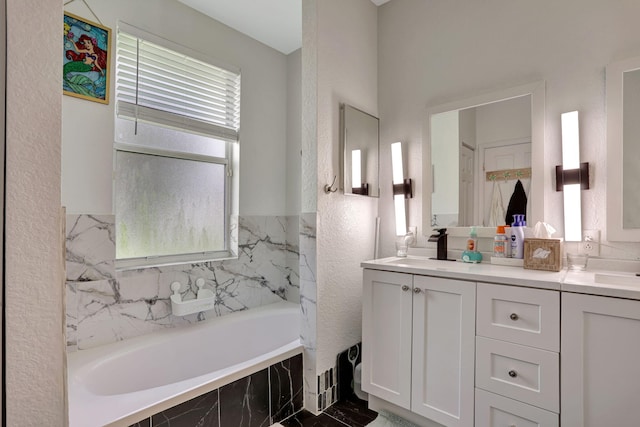 782 NW 16th Pl, Pompano Beach, FL 33060 - bathroom with tiled bath and double vanity