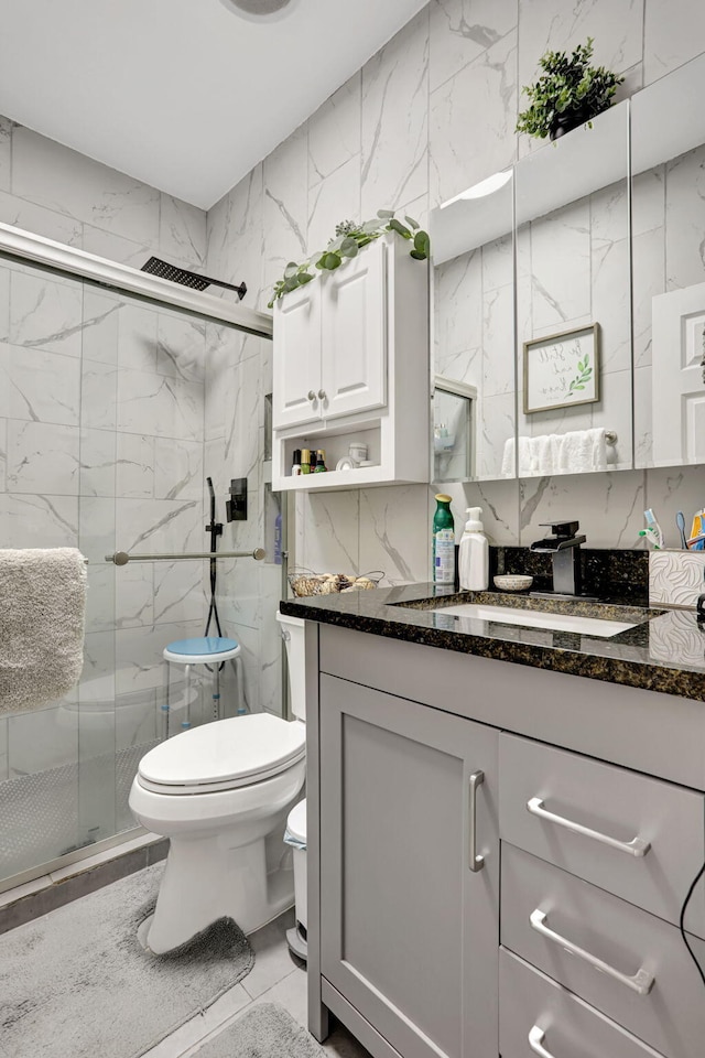 782 NW 16th Pl, Pompano Beach, FL 33060 - full bathroom with vanity, a marble finish shower, and tile walls