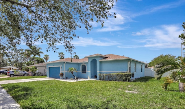 782 NW 16th Pl, Pompano Beach, FL 33060 - ranch-style house with concrete driveway, a garage, and stucco siding