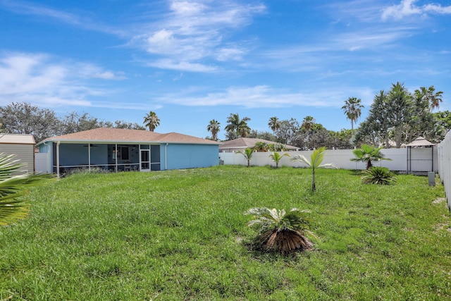 782 NW 16th Pl, Pompano Beach, FL 33060 - fenced backyard with a sunroom