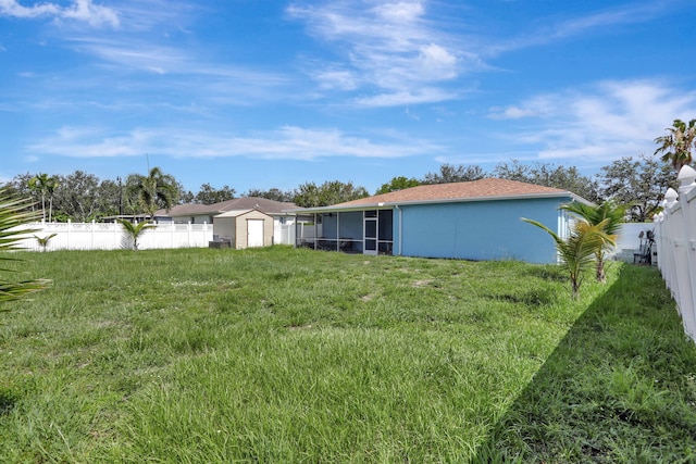 782 NW 16th Pl, Pompano Beach, FL 33060 - view of yard featuring a sunroom and a shed