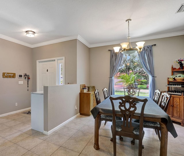 782 NW 16th Pl, Pompano Beach, FL 33060 - dining room with a chandelier, ornamental molding, and light tile patterned floors