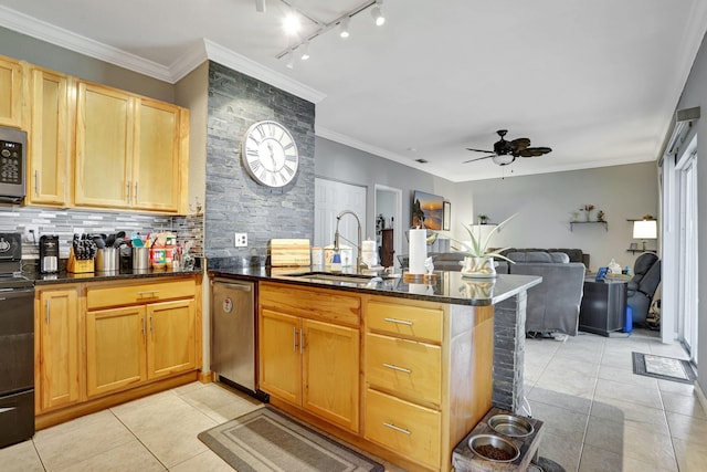 782 NW 16th Pl, Pompano Beach, FL 33060 - kitchen with a peninsula, ceiling fan, appliances with stainless steel finishes, light tile patterned floors, and backsplash