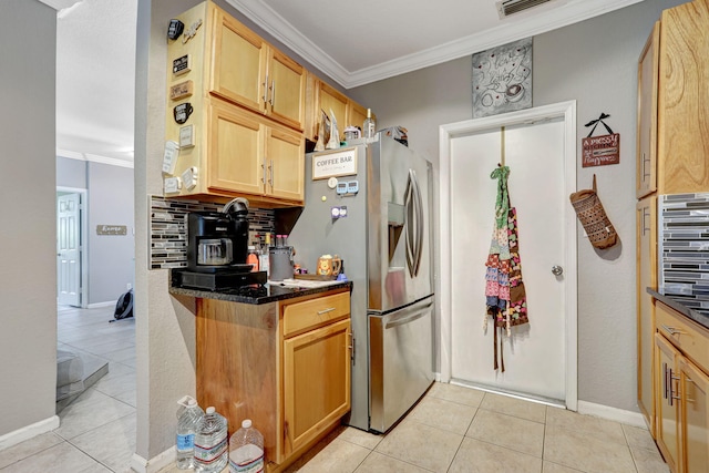 782 NW 16th Pl, Pompano Beach, FL 33060 - kitchen featuring ornamental molding, stainless steel fridge with ice dispenser, light tile patterned floors, dark stone counters, and light brown cabinetry