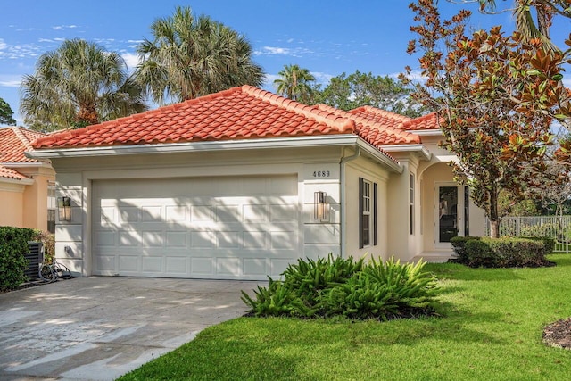 4689 Hammock Cir, Delray Beach, FL 33445 - mediterranean / spanish-style home featuring stucco siding, a tiled roof, an attached garage, and concrete driveway