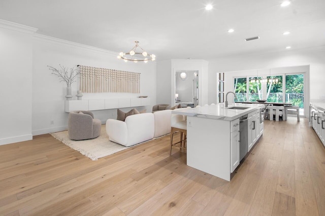 4689 Hammock Cir, Delray Beach, FL 33445 - kitchen with a chandelier, a sink, dishwasher, light wood-style flooring, and recessed lighting