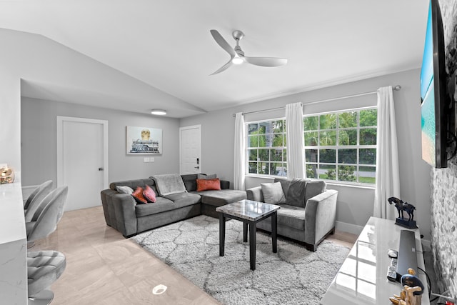 2471 SE Leithgow St, Port Saint Lucie, FL 34952 - living area featuring a ceiling fan and vaulted ceiling