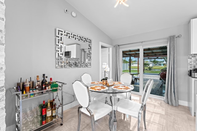 2471 SE Leithgow St, Port Saint Lucie, FL 34952 - dining area with vaulted ceiling