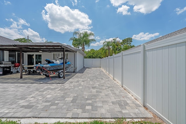 2471 SE Leithgow St, Port Saint Lucie, FL 34952 - fenced backyard with area for grilling