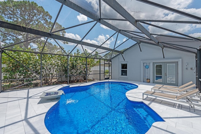 2471 SE Leithgow St, Port Saint Lucie, FL 34952 - view of pool featuring french doors, a patio, and a lanai