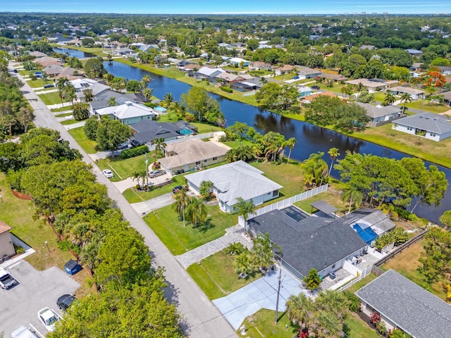 2471 SE Leithgow St, Port Saint Lucie, FL 34952 - aerial view of residential area featuring a nearby body of water