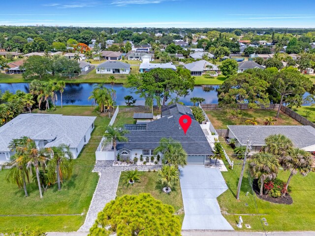 2471 SE Leithgow St, Port Saint Lucie, FL 34952 - aerial view of residential area featuring a large body of water