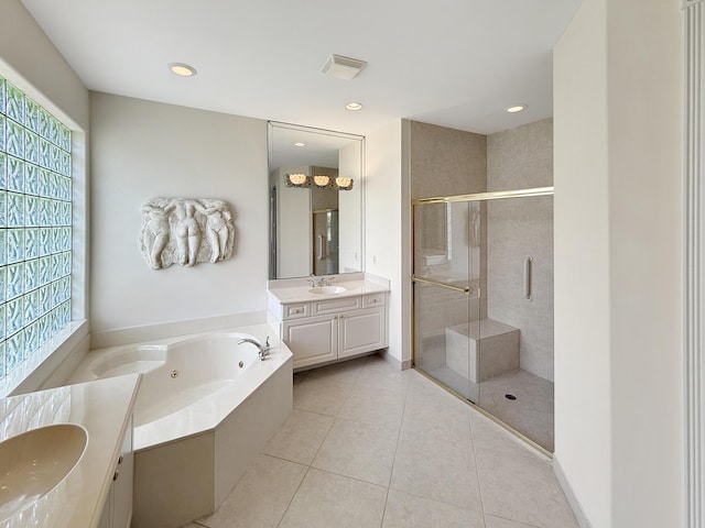 7725 Royale River Ln, Lake Worth, FL 33467 - full bath featuring vanity, a jetted tub, a stall shower, tile patterned flooring, and recessed lighting