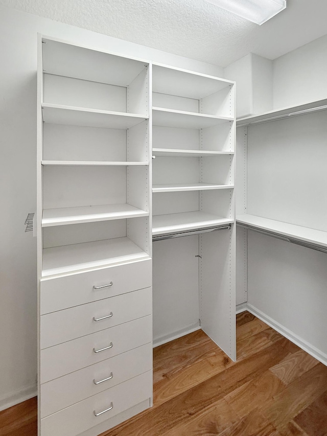 7725 Royale River Ln, Lake Worth, FL 33467 - spacious closet with wood finished floors