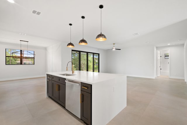13590 82nd St N, Loxahatchee, FL 33470 - kitchen with a sink, dishwasher, light countertops, open floor plan, and decorative light fixtures