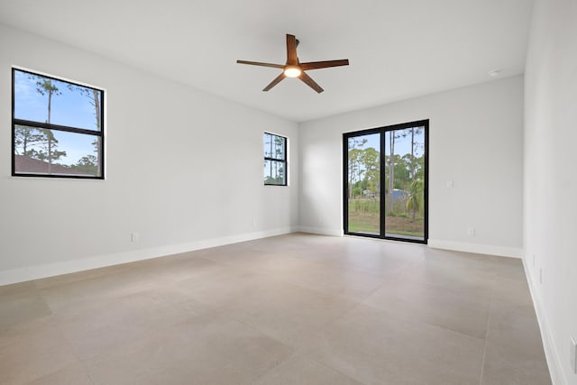 13590 82nd St N, Loxahatchee, FL 33470 - unfurnished room featuring a ceiling fan and baseboards