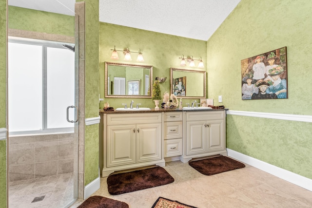 5986 Vista Linda Ln, Boca Raton, FL 33433 - bathroom with plenty of natural light, double vanity, a shower stall, and baseboards