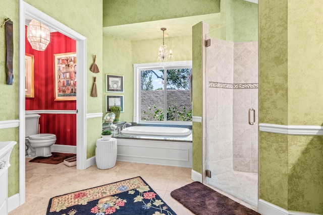 5986 Vista Linda Ln, Boca Raton, FL 33433 - bathroom featuring a chandelier, a garden tub, a shower stall, toilet, and tile patterned floors