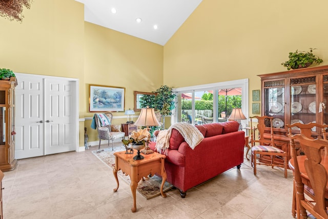 5986 Vista Linda Ln, Boca Raton, FL 33433 - living room with high vaulted ceiling, recessed lighting, light tile patterned floors, and baseboards
