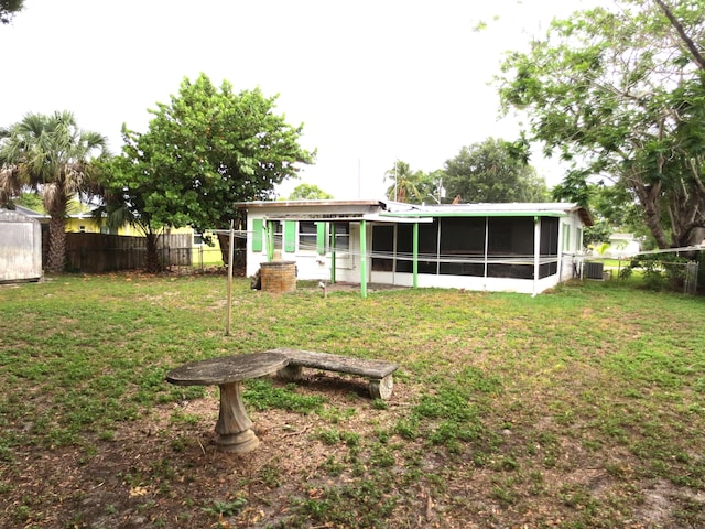 213 Osceola Ave, Fort Pierce, FL 34982 - back of property with a sunroom