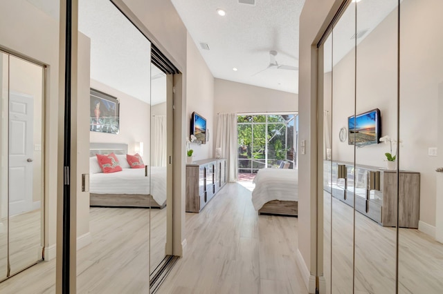 6690 Remington Pl, Lake Worth, FL 33463 - hall featuring vaulted ceiling, light wood finished floors, and baseboards
