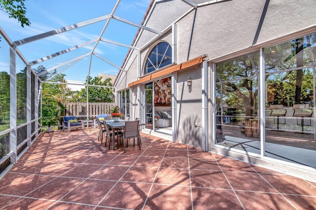 6690 Remington Pl, Lake Worth, FL 33463 - view of patio featuring outdoor dining area and glass enclosure