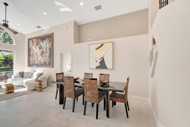 6690 Remington Pl, Lake Worth, FL 33463 - dining room with high vaulted ceiling, recessed lighting, baseboards, and ceiling fan
