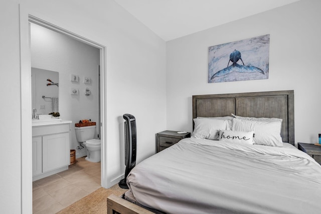 460 Ne 4th Lane End Unit E Of Us1And Tp, Florida City, FL 33034 - bedroom featuring lofted ceiling, light tile patterned floors, ensuite bath, and a sink