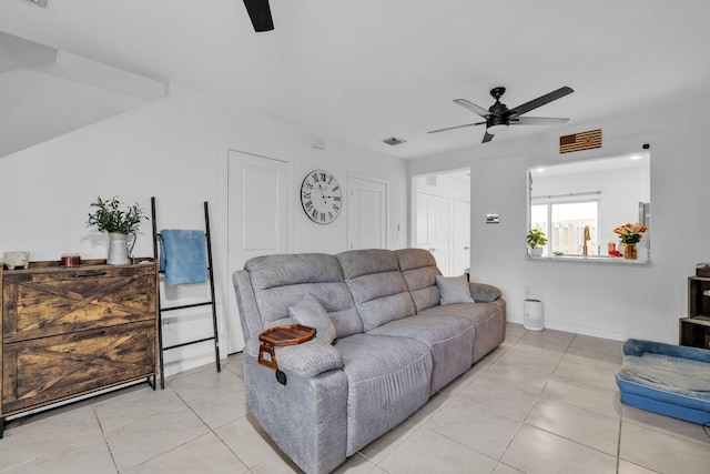 460 Ne 4th Lane End Unit E Of Us1And Tp, Florida City, FL 33034 - living room with a ceiling fan, light tile patterned floors, and baseboards