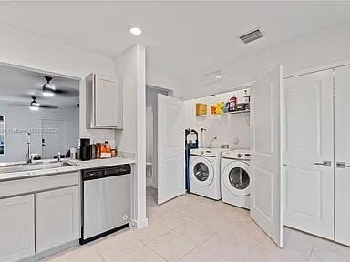 460 Ne 4th Lane End Unit E Of Us1And Tp, Florida City, FL 33034 - laundry area with separate washer and dryer, a ceiling fan, and light tile patterned flooring