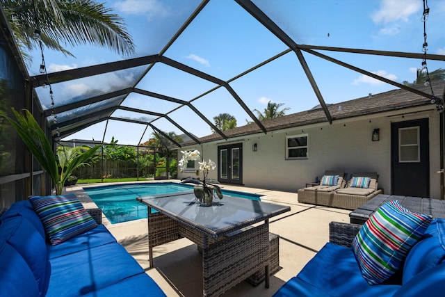 14244 Horseshoe Trce, Wellington, FL 33414 - view of swimming pool with an outdoor living space, a patio, french doors, and glass enclosure