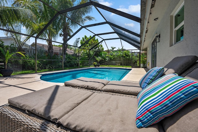 14244 Horseshoe Trce, Wellington, FL 33414 - view of swimming pool with a patio, a fenced backyard, and a lanai