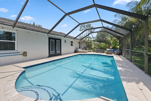 14244 Horseshoe Trce, Wellington, FL 33414 - swimming pool featuring an outdoor living space, french doors, a patio, and a lanai