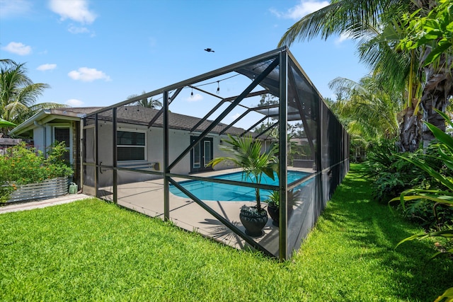 14244 Horseshoe Trce, Wellington, FL 33414 - swimming pool with a yard, a patio area, and a lanai
