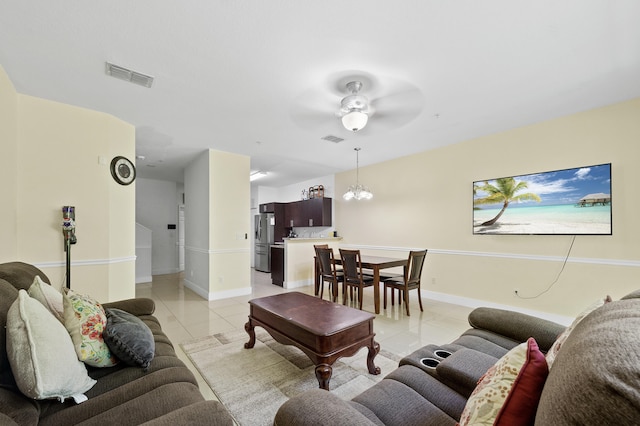 899 Pipers Cay Dr, West Palm Beach, FL 33415 - living area featuring light tile patterned floors, baseboards, and ceiling fan