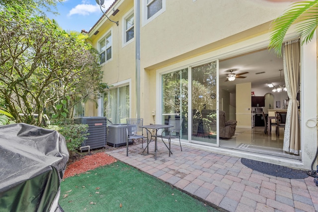 899 Pipers Cay Dr, West Palm Beach, FL 33415 - view of patio featuring central air condition unit