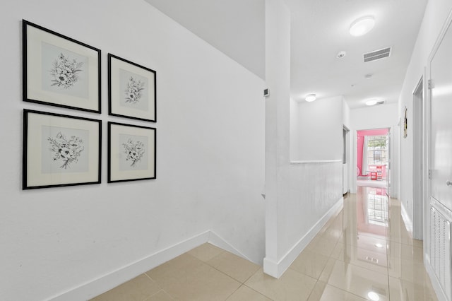 899 Pipers Cay Dr, West Palm Beach, FL 33415 - hall featuring baseboards and light tile patterned floors