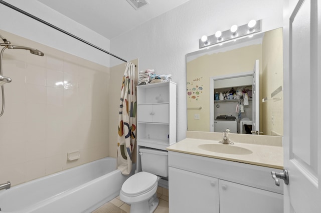 899 Pipers Cay Dr, West Palm Beach, FL 33415 - full bath featuring vanity, separate washer and dryer, shower / bathtub combination with curtain, toilet, and tile patterned flooring