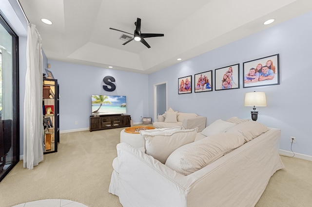 756 SW Pelican Cv, Port Saint Lucie, FL 34986 - carpeted living area featuring ceiling fan, a tray ceiling, recessed lighting, and baseboards