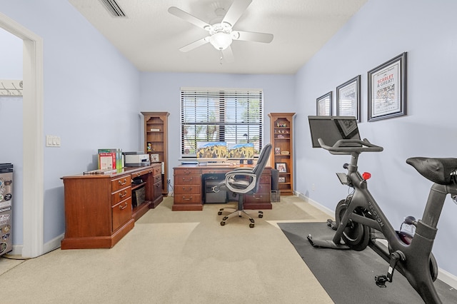 756 SW Pelican Cv, Port Saint Lucie, FL 34986 - home office featuring a ceiling fan, light colored carpet, and baseboards