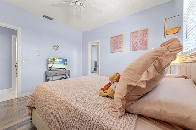 756 SW Pelican Cv, Port Saint Lucie, FL 34986 - bedroom with wood finished floors, baseboards, and ceiling fan