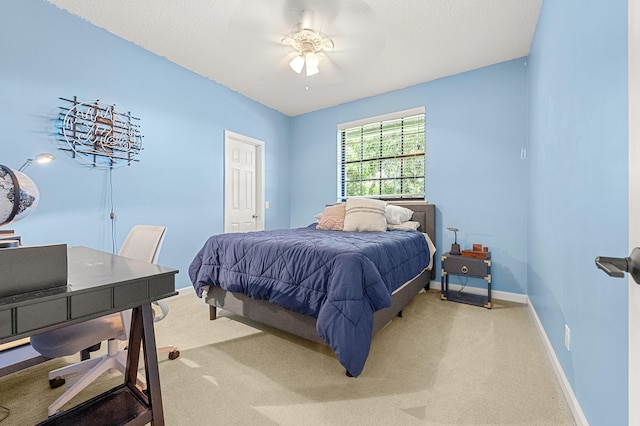 756 SW Pelican Cv, Port Saint Lucie, FL 34986 - bedroom featuring light carpet, baseboards, and ceiling fan