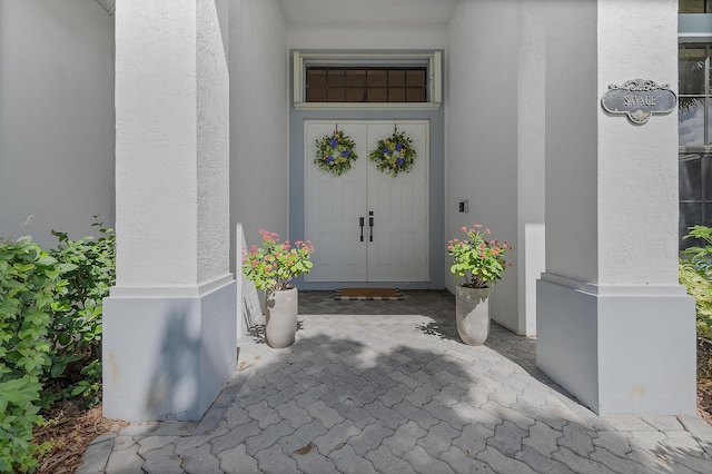 756 SW Pelican Cv, Port Saint Lucie, FL 34986 - view of exterior entry with stucco siding