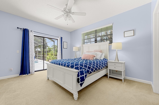 756 SW Pelican Cv, Port Saint Lucie, FL 34986 - bedroom with access to outside, light colored carpet, and baseboards
