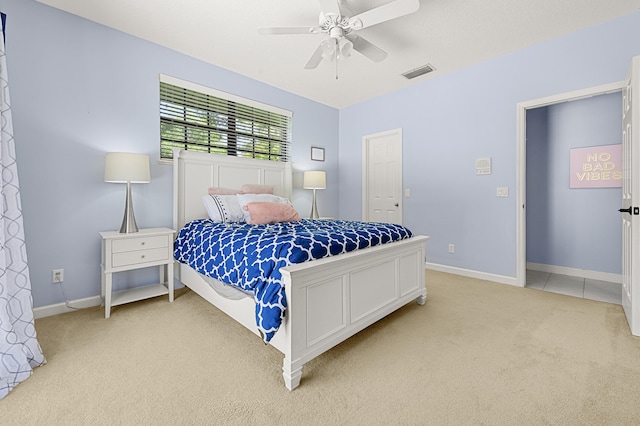 756 SW Pelican Cv, Port Saint Lucie, FL 34986 - bedroom with light colored carpet, baseboards, and ceiling fan