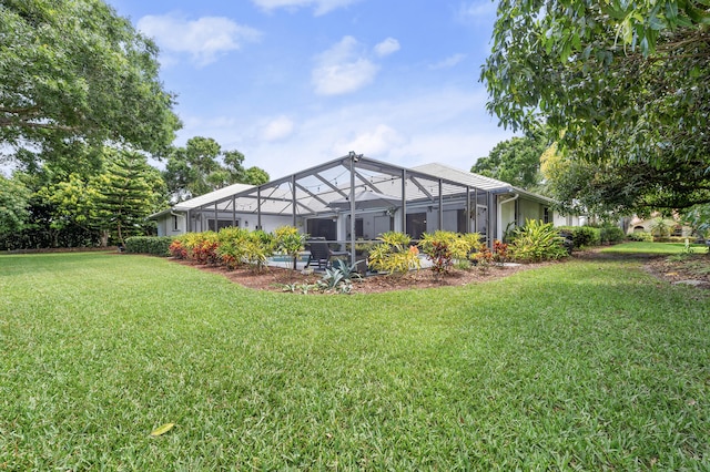 756 SW Pelican Cv, Port Saint Lucie, FL 34986 - view of green lawn with glass enclosure